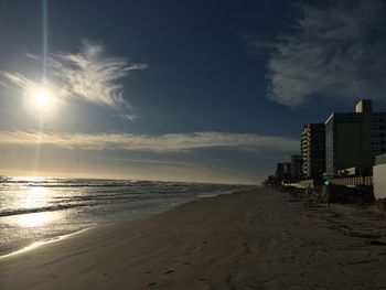 View of beach against sky during sunset