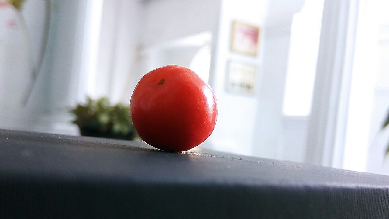 CLOSE-UP OF FRUIT ON TABLE AT HOME