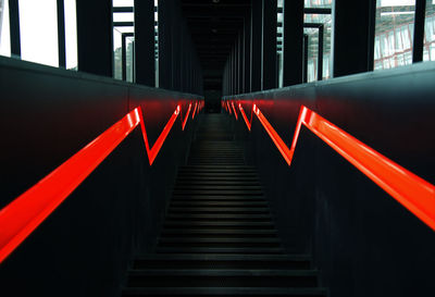 Illuminated staircase at railroad station