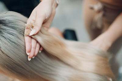 Close-up of woman with hands