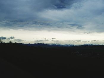 Scenic view of silhouette landscape against sky