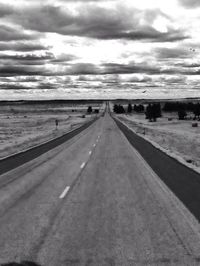 View of road against cloudy sky