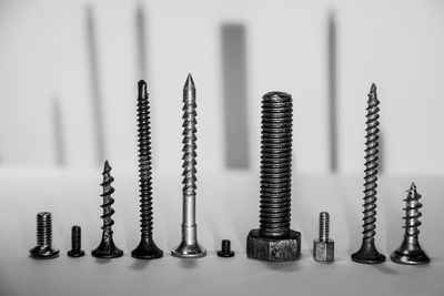 Close-up of nails on table