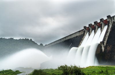 Water spilling over the dam