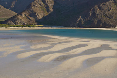 Scenic view of beach against mountain in balandra beach