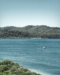 Scenic view of sea against clear sky