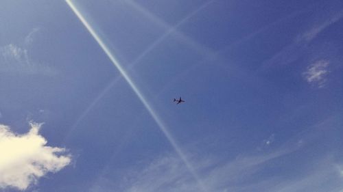 Low angle view of vapor trail in sky