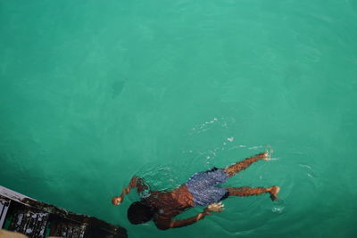 High angle view of person swimming in sea