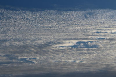 Scenic view of snow covered landscape against sky