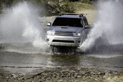 Blurred motion of car on sea