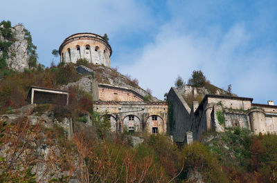 Low angle view of old building against sky