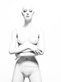 Naked mannequin against white background