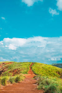 View of landscape against blue sky