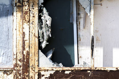 Close-up of abandoned house window