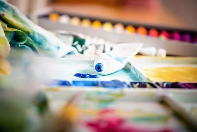 Close-up of paint tube on palette