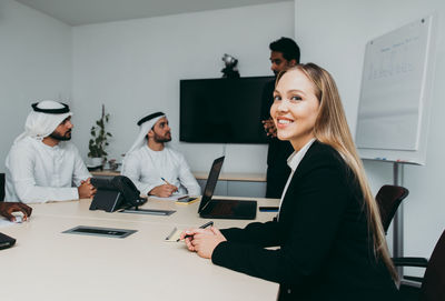 Group of people working on table