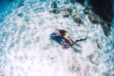 Man swimming in sea