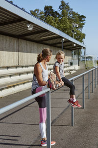 Mother and daughter on stadium