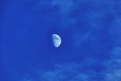 Low angle view of moon in sky