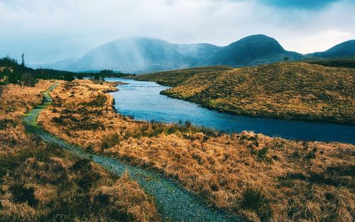 Dramatic cloudy landscape scenery  at derryclare natural reserve, connemara, galway, ireland