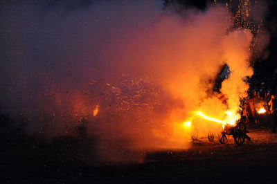 Firework display at night