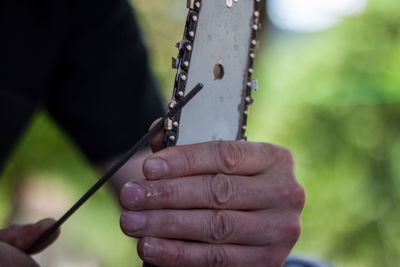 Cropped image of man working outdoors