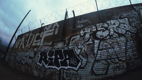 Low angle view of graffiti wall