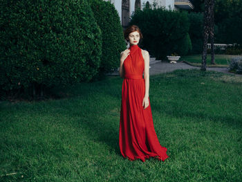 Portrait of woman standing in park