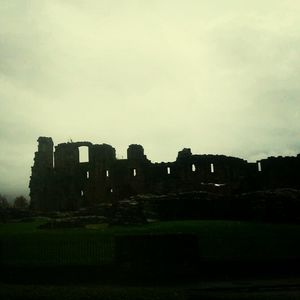 View of buildings against cloudy sky