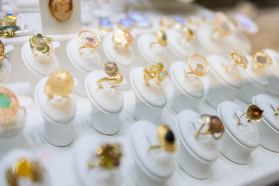 Close-up of wedding rings on table