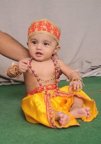 Portrait of cute baby boy with inflatable ring