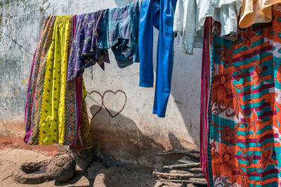 Clothes drying on wall