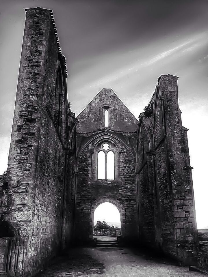 architecture, built structure, arch, building exterior, history, sky, old, old ruin, low angle view, the past, stone wall, ancient, abandoned, cloud - sky, ruined, cloud, damaged, day, no people, outdoors