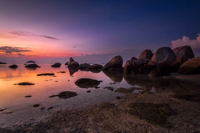 Scenic view of sea at sunset