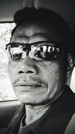 Portrait of man wearing sunglasses