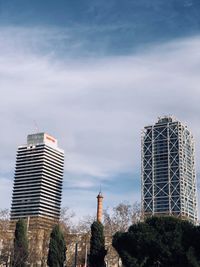 Low angle view of skyscrapers against sky