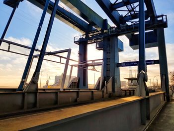 Low angle view of bridge against sky during sunset