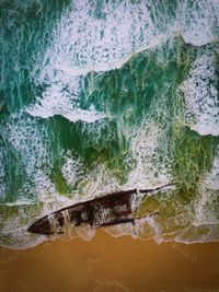 Aerail view of shipwreck in water