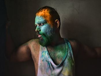 Tri color of indian flag on bearded man side faced portrait