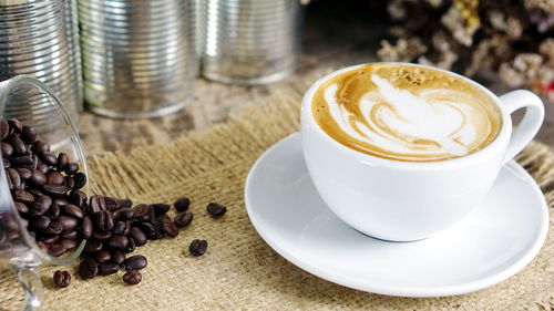 Close-up of coffee cup on table