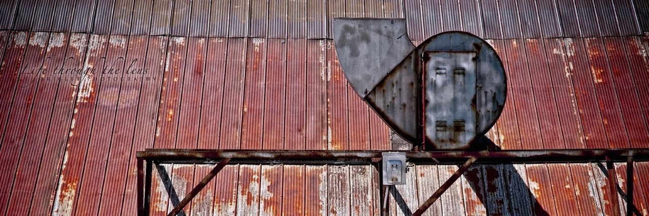 metal, rusty, built structure, building exterior, close-up, part of, transportation, old, architecture, day, outdoors, protection, no people, metallic, weathered, wood - material, abandoned, wall - building feature, safety, mode of transport