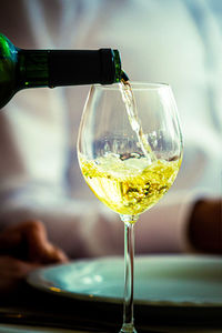 Close-up of wineglass on table