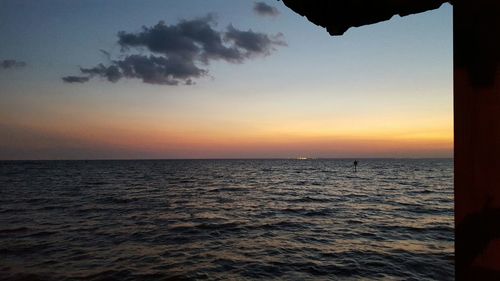 Scenic view of sea at sunset