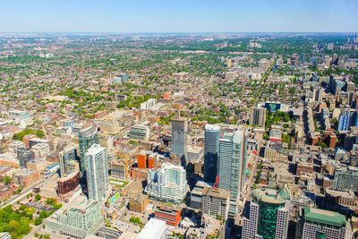 High angle view of city buildings against sky