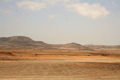 Scenic view of desert against sky