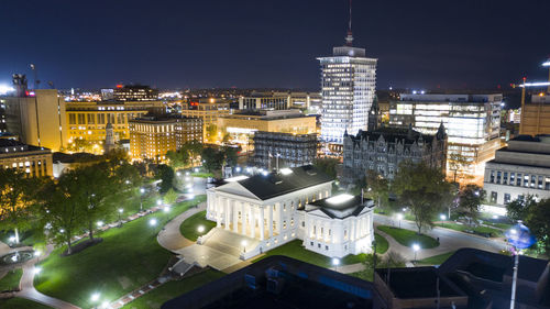 High angle view of city buildings at night