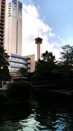Buildings in city against sky