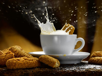 Close-up of coffee cup on table