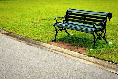 Empty bench in park