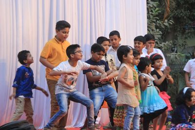 Children dancing on stage